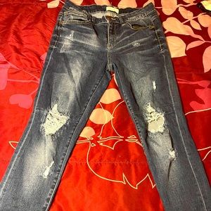 Distressed denim jeans